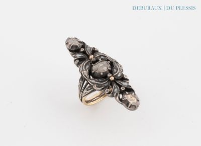 a close up of a ring on a white surface