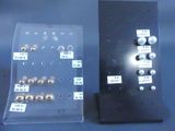 two different types of buttons in a display case