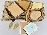 a picture of a picture frame and a mirror on a table
