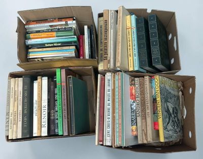 boxes of books are stacked on top of each other on a table