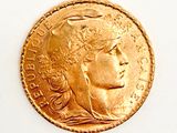 an image of a gold coin with a woman ' s head on it
