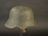 helmet on a stand on a gray background with a black background