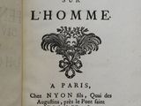 an old book with a black and white title on it