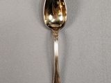 a spoon that is sitting on a table