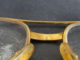 a close up of a pair of glasses on a table