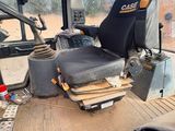 an image of a construction vehicle with a seat and steering