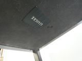 a sign on the ceiling of a bus that says bicycle