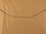 a brown envelope with a string attached to it