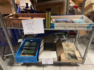 a cart with books on it in a store