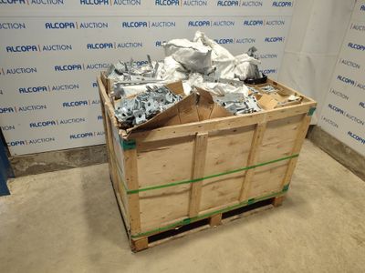 a wooden crate with a bunch of nuts on top of it