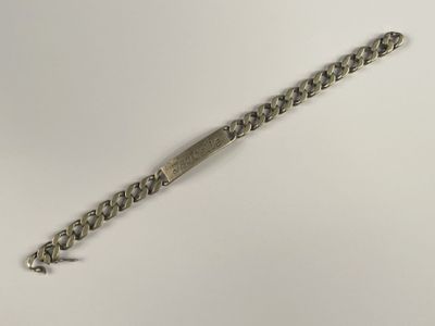 Gourmette en argent 925 millièmes, marquée Isabelle.