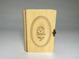 an old book with a picture of a woman on it