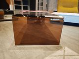 a glass table with a glass top in a living room