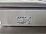 a close up of a stainless steel oven with a label on it