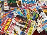 a lot of comic books on the floor on the floor
