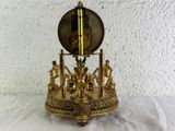 a clock that is sitting on top of a table
