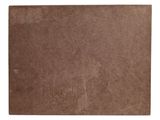 a close up of a piece of brown paper on a white background