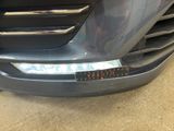 a close up of the front bumper of a car