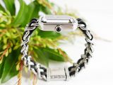 an image of a silver apple watch with a chain bracelet on it