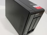an image of a black desktop computer sitting on top of a white table