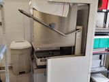 an image of a kitchen with a sink and a refrigerator
