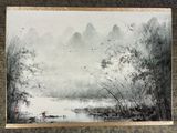 chinese painting of a boat on a river with mountains in the background
