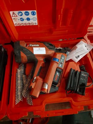 a red tool box with tools inside of it