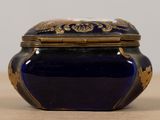a blue and gold box sitting on a table