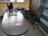 a desk with a laptop and a printer on it