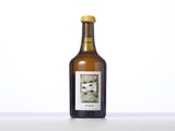 a bottle of wine that is sitting on a table