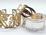two rings that are sitting next to each other on a table