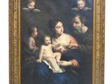 une image d'une peinture représentant une femme tenant un bébé sur ses genoux