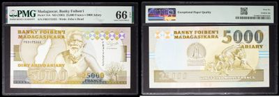 three different bank notes with a woman on them on display