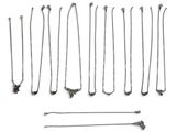 many different types of necklaces on a white background