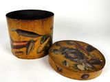 a small wooden box with a painting on it