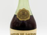 bottles of liquor on a white surface with a white background