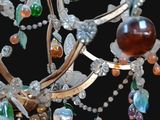 a chandelier with a bunch of beads hanging from it