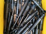 a lot of screws in a box on the table