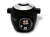 a black and silver rice cooker on a white background