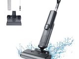 gros plan d'un aspirateur sur fond blanc