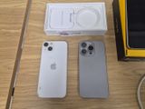 two iphones sitting next to each other on a table