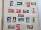 an open book with a lot of stamps on it