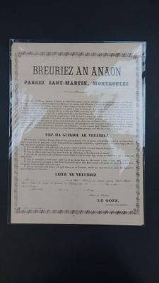 un vieux document sur lequel figure la photo d'un homme