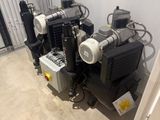 many different types of air compressors in this room