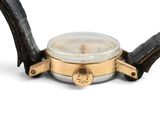 an image of a close up of a watch on a white surface