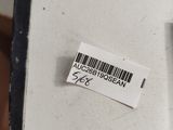 a sticker on the back of a suitcase that has a barcode on it