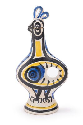a ceramic vase with a blue and yellow bird on it