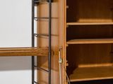 a wooden shelf with shelves and shelves on it