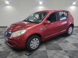a picture of a red car parked on a checkered floor