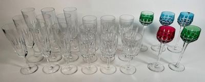 a lot of wine glasses that are sitting on a table
